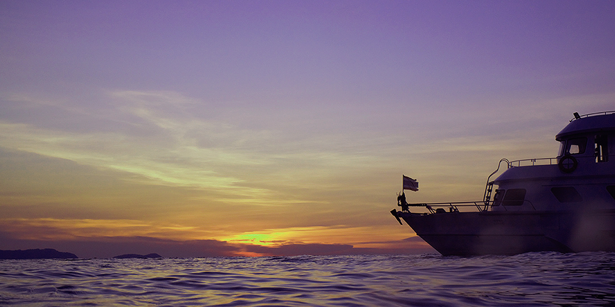 A Lone Liveaboard In The Mergui Archipelago At Sunset Burma Myanmar